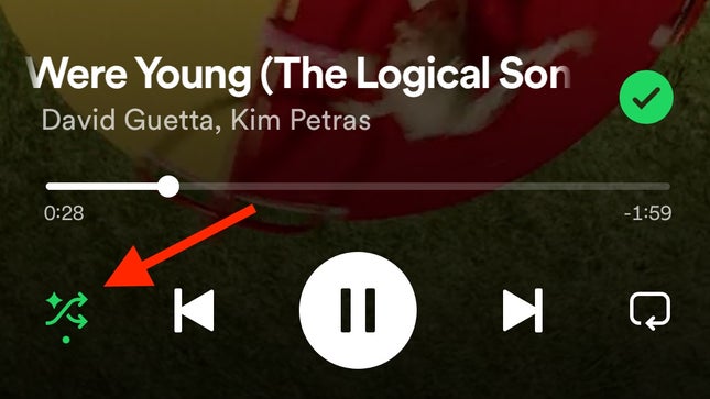 Spotify's shuffle button is overlaid with glitter emojis.